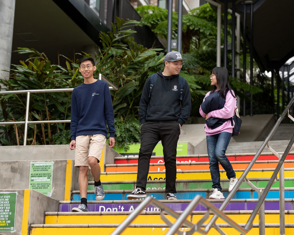 students walking down stairs