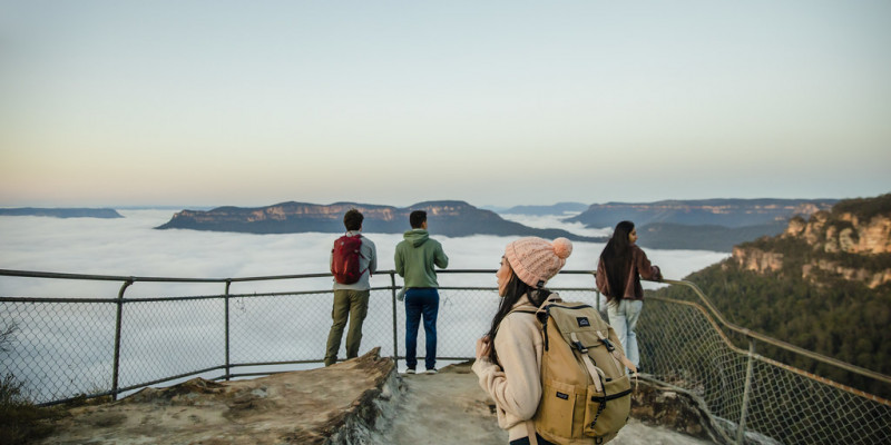 group of people at blue mountains olympian rock looking at NSW landscape